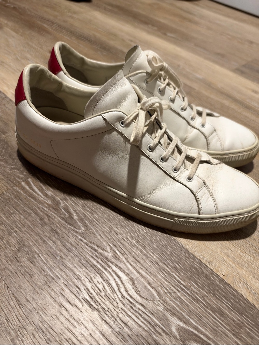 Common Projects White Leather Low-Top Sneakers with Red Heel Tab